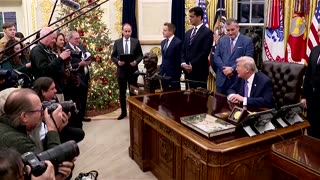 Trump signs order aimed at curbing state AI laws