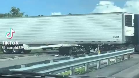 Aftermath of Truck driver killing three people after making illegal turn in Florida