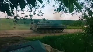 Brazilian Soldiers Drive Away in Russian APC