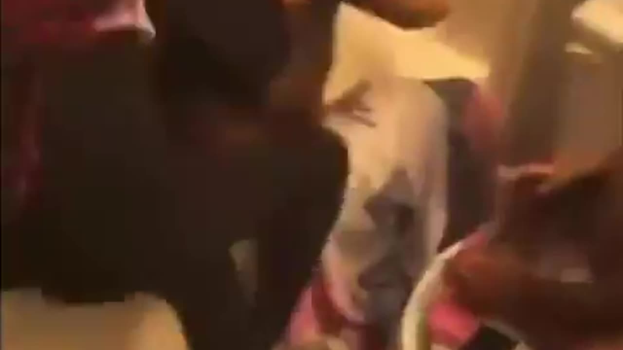 Sheboons jump another one in the shower with a baby nearby