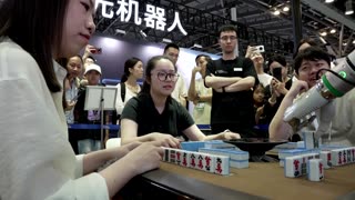 Robots spar, play Mahjong at China's AI conference