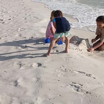 Playing in sand Thanksgiving 2024