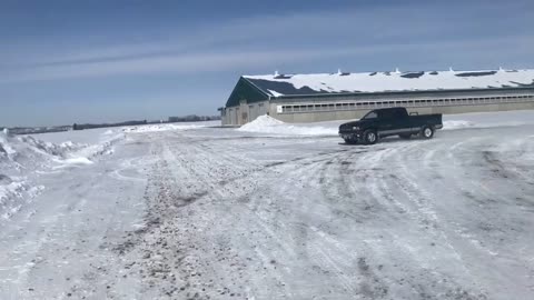Pickup Full Sends Into Snowbank