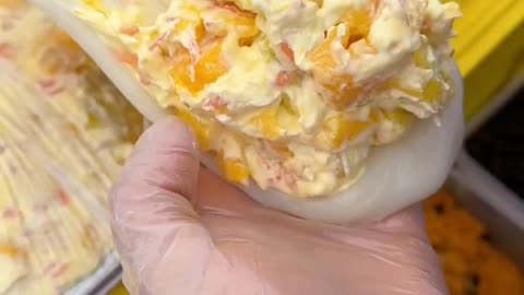 Mochi filled with a mouthfull whipped cream and fruits
