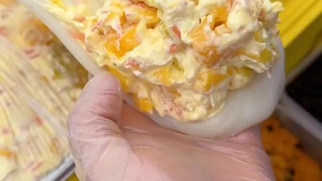 Mochi filled with a mouthfull whipped cream and fruits