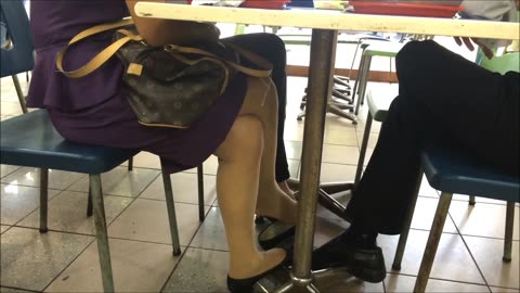 OL (in nylons) dangles her pumps...