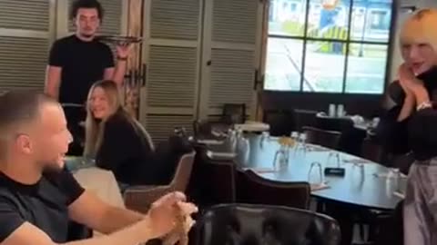 Magician showcases his skills by turning a towel into a living snake.