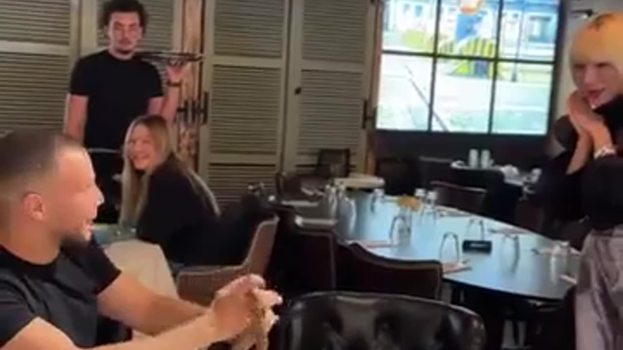 Magician showcases his skills by turning a towel into a living snake.