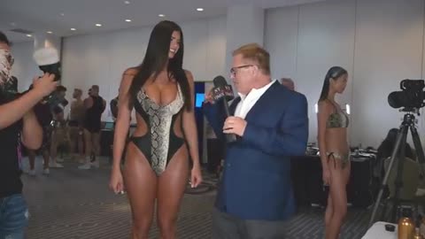 Very Tall Model Lucciana Beynon wears Mister Triple X at Art Hearts Fashion Miami Swim