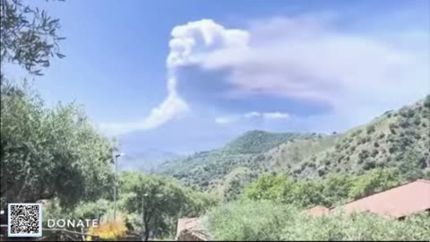 Italy's Mount Etna volcano erupts with a massive ash cloud and a "lava fountain"