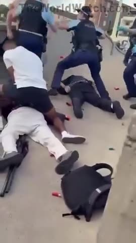 Aussie bystander is seen kicking one of the suspects in the head at Bondi Beach