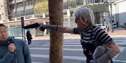 A Crazy Transgender Pulls A Gun Unto A Street Preacher (They Hate God's Message)