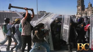 Thousands protest against government in Mexico as clashes leave 120 injured