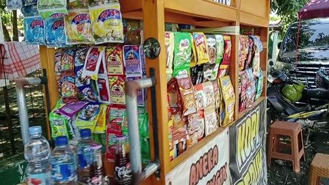 buying ice cream at Bang Yanto's stall