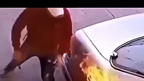 Guy set's fire to his car at gas station