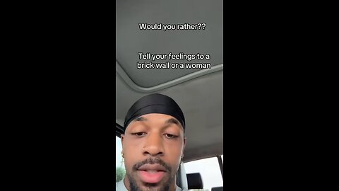 woman or brick wall?