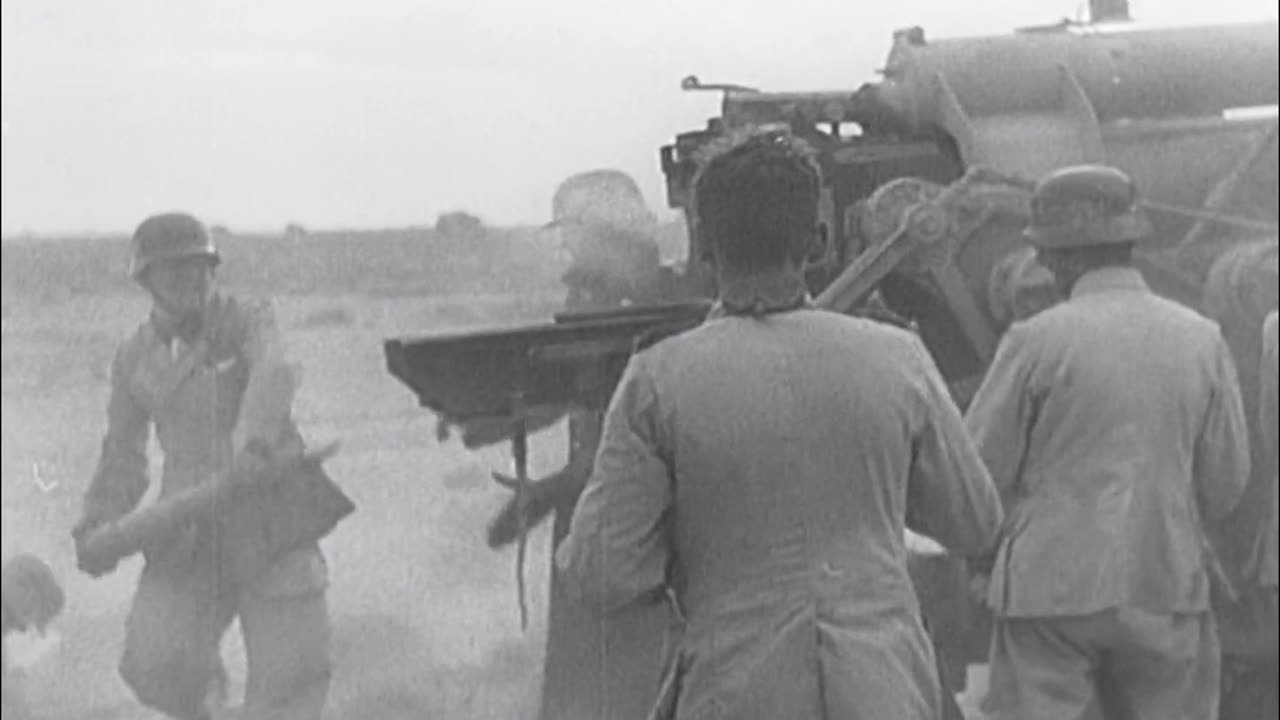 rapidsave.com_88mm_flak_gun_in_action_against_ground_targets_in-wuj5xc3uwsqc1
