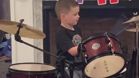 This kid is a born drummer... it was written