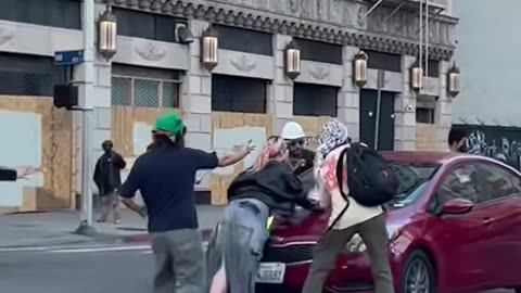 Woman ran over by an individual driving a car during protest