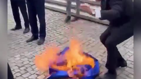 Polish politician Grzegorz Braun threw down the European Union flag, wiped his shoes with it