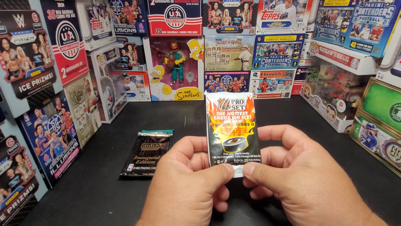 Packets of Skybox basketball, Pro Set Hockey, Pro Set Football and Score Football