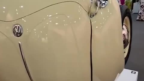 Ichwan Noor transforms Volkswagen Beetles into spherical sculptures, merging automotive design art