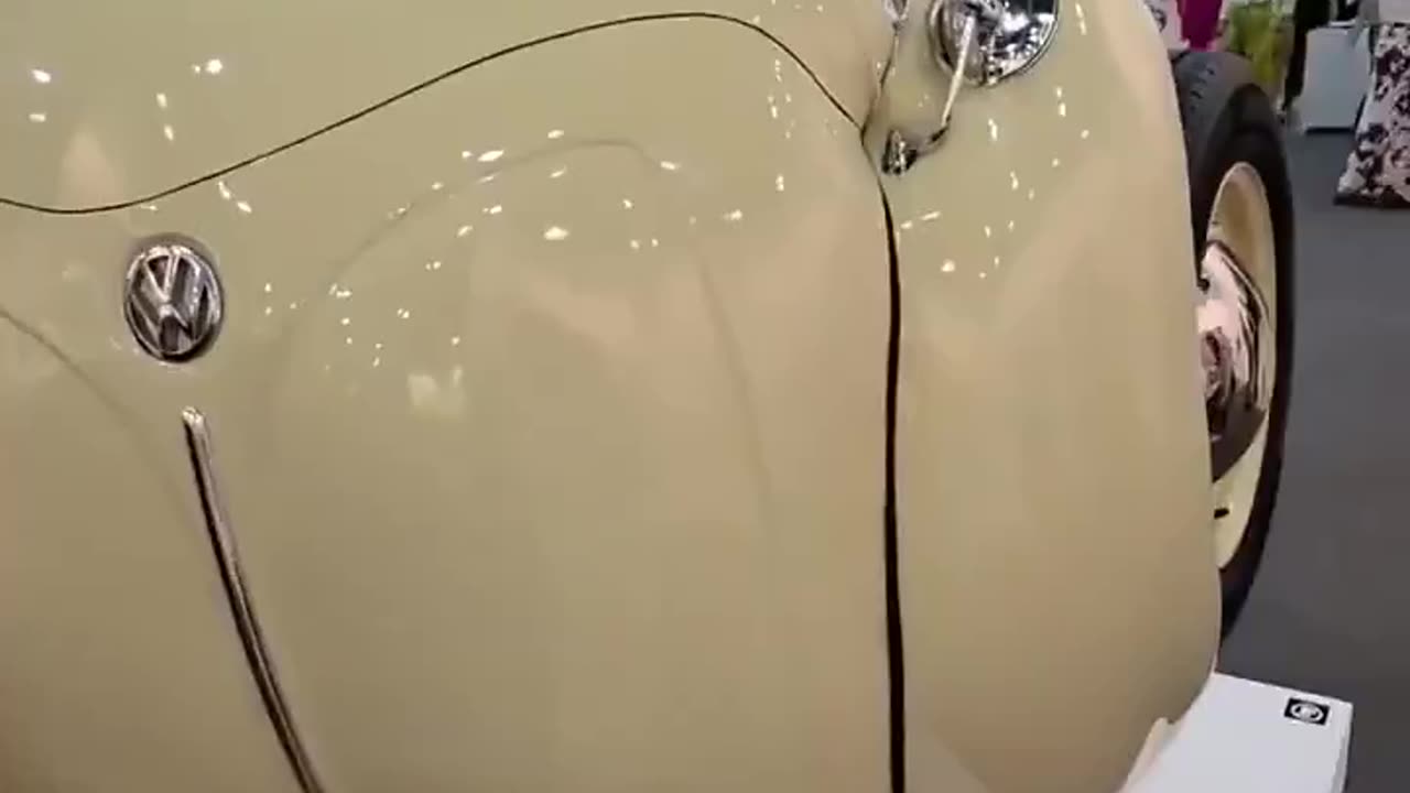 Ichwan Noor transforms Volkswagen Beetles into spherical sculptures, merging automotive design art