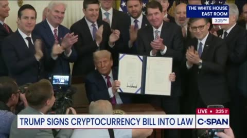 President Donald Trump signs the cryptocurrency "GENIUS Act" into law.