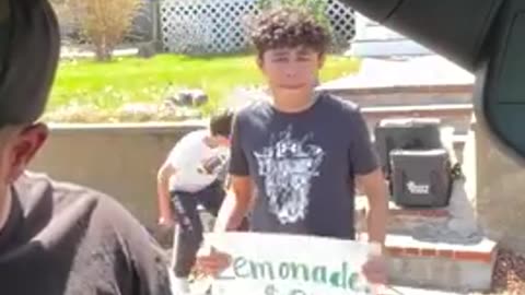 Dude rolls up on two kids selling lemonade and does this...