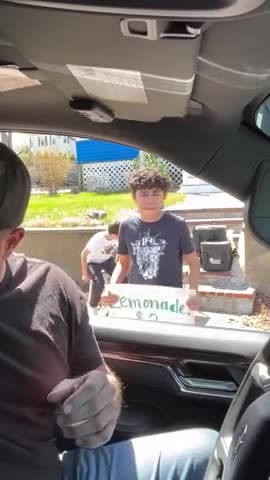Dude rolls up on two kids selling lemonade and does this...