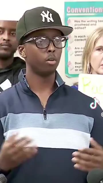 Somali daycare spokesman, speaks to the media after his “business” was allegedly broken into