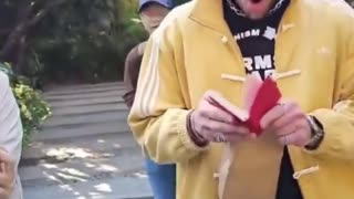 Hasan Piker is thrilled to get a gift of Mao's Little Red Book in China (75 *million* dead