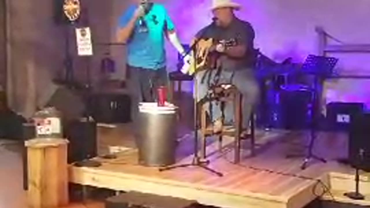 Me at karaoke when I was considerably larger...