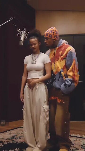 💥NLE Choppa plants a kiss on fiancée Erica Raven moments before her debut studio session