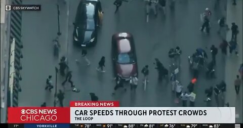 Police try to get away from violent protesters in Chicago Illinois