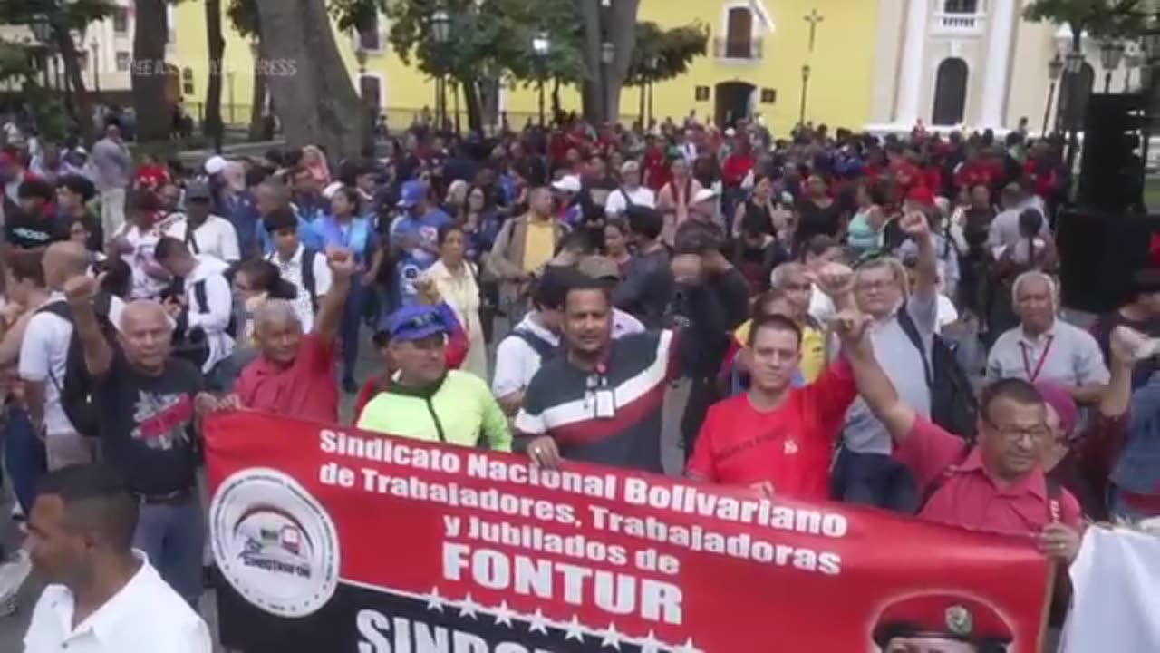 Venezuela residents react to Maduro's call to enlist after US warship deployment