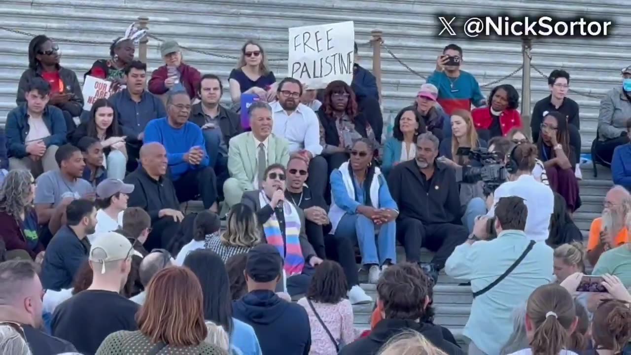 Democrats singing on the steps of the Capitol to protest Trump