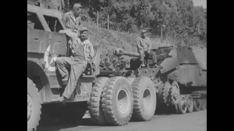 Ward LaFrance M1A1 and M26 towing a knocked out Elefant tank destroyer near Rome in June 1944