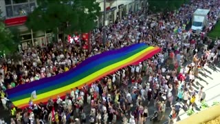 Budapest's banned Pride march swells into mass demonstration