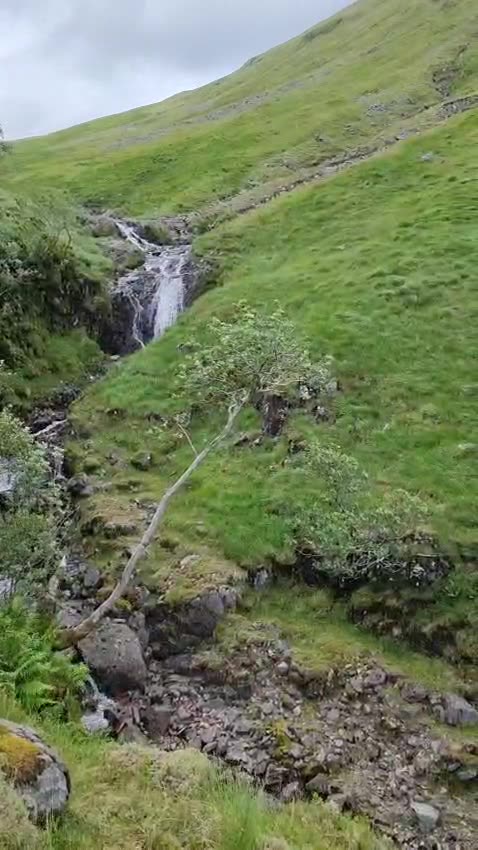 Buachaille Etive Beag: 35 Seconds view of waterfall and pan to mountain range - June 2025