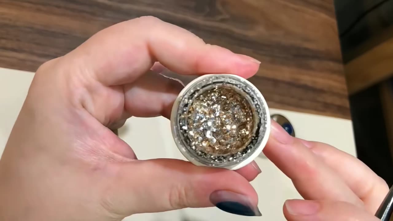 Glitter Nail art with the help of magnet
