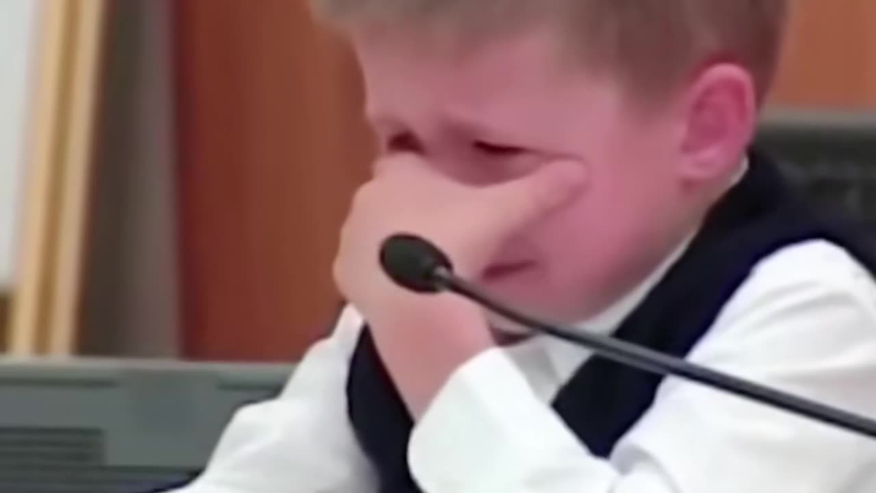 Sad boy crying because of his mother in jail