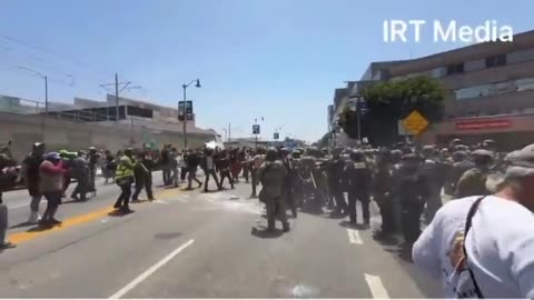 Federal Officers Fire Rubber Pellets on Mexican Flag Waving Invaders
