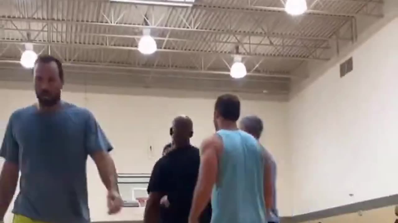 The usual suspect threatening someone over a basketball with a gun..