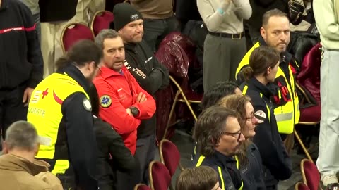 Swiss firefighters applauded as they arrive for memorial ceremony