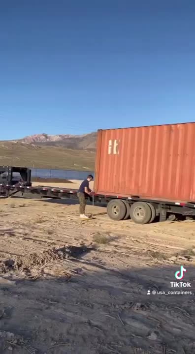 How to Load 2 Containers on the Trailer? Use Dr. Strange Powers and Some Straps and You're Good.