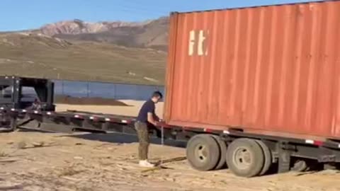 How to Load 2 Containers on the Trailer? Use Dr. Strange Powers and Some Straps and You're Good.