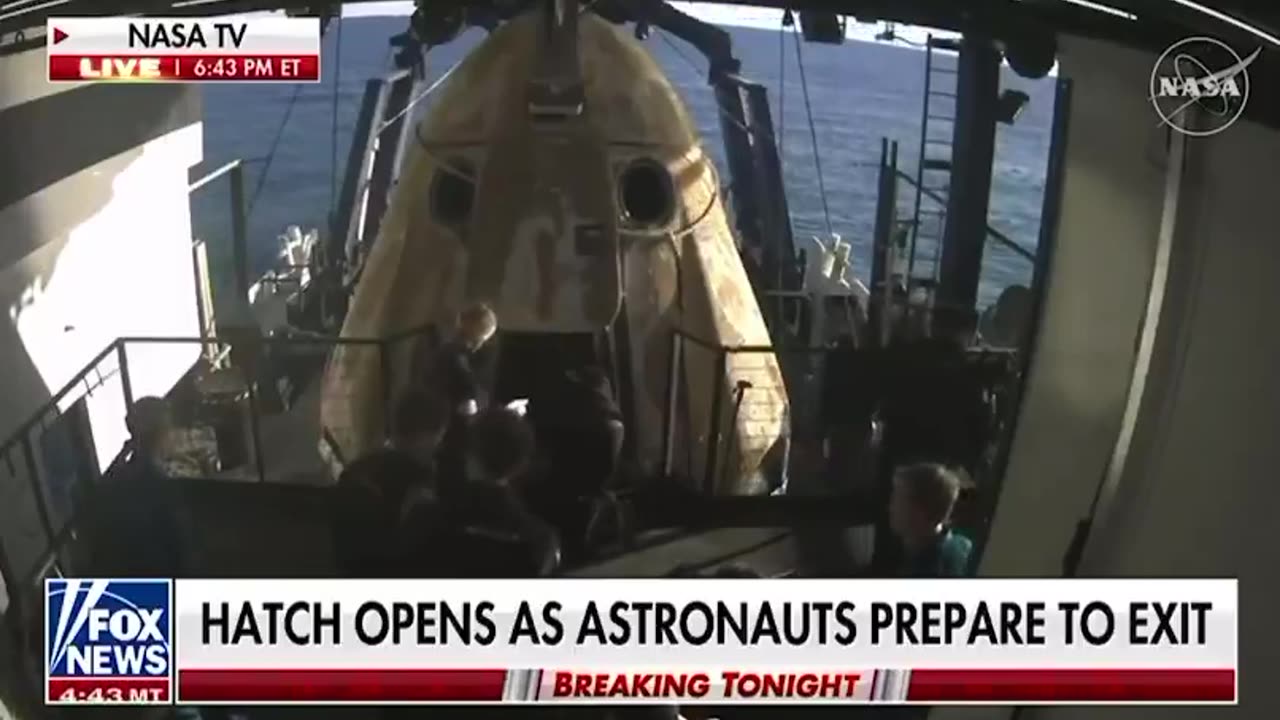 First look at astronauts inside the pod after hatch is opened