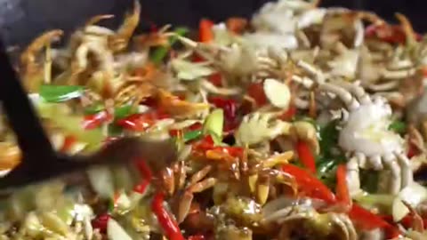 Cooking crab and fried fish