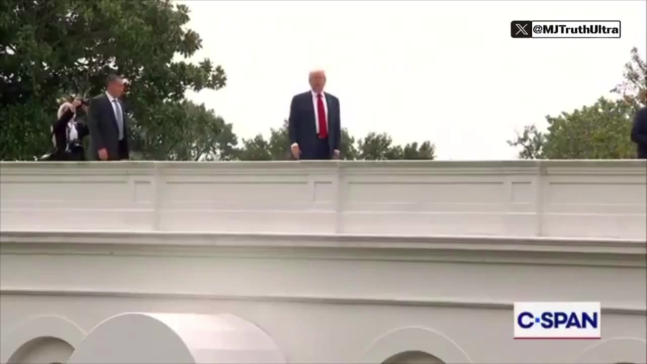 Oh nothing… just the President of the United States taking a little stroll on top of the White House